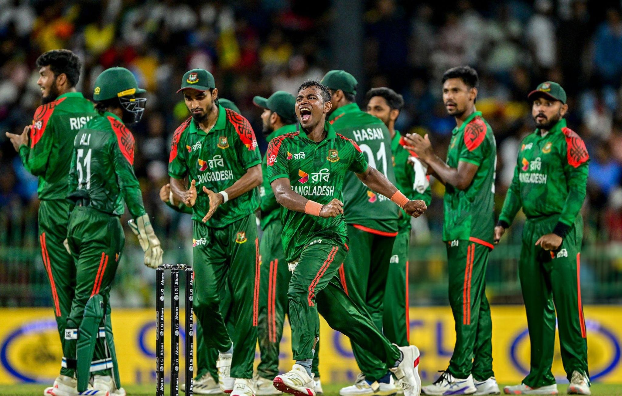 Bangladesh players celebrate a dismissal against Sri Lanka in the second ODI in Colombo